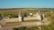 Aerial view of the ruins of a large medieval castle in Europe.