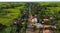 An aerial view of a rural area with houses and trees. Beautiful picture of landscape.