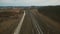 Aerial view: rural landscape, fields, track, high-voltage network in Ukraine