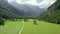 Aerial view of a rural road in alpine scenery of Logar valley, Slovenia