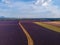 aerial view of rural road through beautiful cultivated lavender field