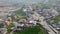 An aerial view of a rural town in the hills