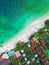 Aerial view of rustic buildings on the shore separated by sea waters, perfect for wallpapers