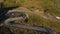 Aerial view of RV / Campervan driving on Transalpina