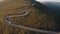 Aerial view of RV / Campervan driving on Transalpina