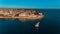 Aerial view of a sailboat on blue water in historical stone town, Zanzibar