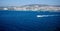 Aerial view of a sailboat drifting peacefully on a tranquil body of water in Kusadasi, Turkey