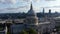 Aerial view of Saint Pauls Cathedral. Famous religious baroque building with large dome. View against bright clouds in