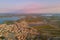 Aerial view of Saintes-Maries-de-la-Mer and wetland of Camargue reserve at sunset, France