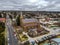 Aerial view of the Saints Mary and Joseph Catholic Cathedral in Armidale against a gray cloudy sky