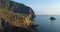 Aerial view of Salina coast, deep cliff, little village in a summer sunset. Blue sea, sky and wind for a peaceful moment