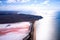 Aerial view of the salt lake, separated from the sea by a sand spit. Copy space