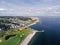 Aerial view on Salthill, Galway city, Ireland, Tilt shift effect, Blackrock diving board, Warm sunny day. People swimming in the