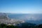 Aerial view San Felice Circeo, Italian city in province Latina on Tyrrhenian sea, with reflection in sea water of shadow of cross