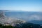 Aerial view San Felice Circeo, Italian city in province Latina on Tyrrhenian sea, with reflection in sea water of shadow of cross