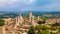 Aerial view of the San Gimignano Torre Grossa with a blue sky in the background, Italy, Tuscany