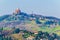 Aerial view of the sanctuary of Madonna di San Luca connected to Bologna with the world longest covered arcade....IMAGE