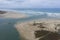 Aerial view of a sand dredger boat at the mouth of the Murray River in South Australia