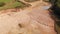 Aerial view of a sand, gravel mine quarry full with water.