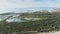 Aerial view of sand spit that goes into the sea. Aerial video shooting. Beach, coastline. Sand spit in sunny summer