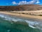 Aerial view on sandy dunes and turquoise water of Sotavento beach, Costa Calma, Fuerteventura, Canary islands, Spain