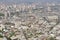 Aerial view of the Santiago city with the blue smog from the San Cristobal Hill, Santiago, Chile