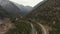 Aerial View of a Scenic Road in the Canadian Mountain Landscap