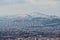 Aerial view of the scenic skyline of Athens and nearby mountains