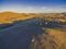 Aerial view of scenic yellow hills.