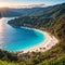 Aerial view of sea bay, sandy beach with umbrellas, trees, mountain at sunny day in summer. Blue lagoon in Oludeniz,