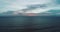 Aerial view of sea and cloudy sunset sky