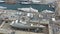 Aerial view of sea dry dock in La Ciotat city, France, the cargo crane, boats on repair, a luxury sail yacht and motor