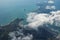 Aerial view of sea islands and clouds from the plane