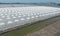 Aerial view of sea salt farm. Pile of brine salt. Raw material of salt industrial. Sodium Chloride mineral. Evaporation and