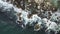 Aerial view of sea waves and fantastic cliffs, rocky coast.