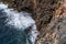 Aerial view of sea waves and fantastic Rocky coast, Danger sea wave crashing on rock coast with spray and foam before storm