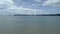 aerial view of seagulls flying over the sea at new chums beach, new zealand