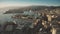 Aerial view of seaport and cityscape of Genoa in the evening, Italy