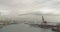 Aerial view. Seaport and loading docks at the port with cranes and multi-colored cargo containers.