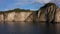 Aerial view of the seascapes of Kamchatka. Majestic cliffs, hills, mountains and sea.