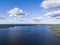 Aerial view of seashore with beach, lagoons. Coastline with sand and water. Landscape. Aerial photography. Birdseye. Sky, clouds.