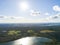 Aerial view of seashore with beach, lagoons. Coastline with sand and water. Landscape. Aerial photography. Birdseye. Sky, clouds.