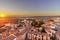 Aerial view of Segovia at sunset in autonomous region of Castile and LeÃ³n, with illuminated buildings and Alcazar. Castle