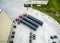 Aerial view of Semi tractor trailers parked with steel coils