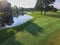 Aerial View of Serene Golf Course with Pond in Fort Wayne