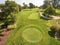 Aerial View of Serene Suburban Golf Course with Autumn Trees