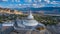 Aerial view Shanti Stupa buddhist white domed stupa overlooks the city of Leh, The stupa is one of the ancient and oldest stupas