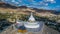 Aerial view Shanti Stupa buddhist white domed stupa overlooks the city of Leh, The stupa is one of the ancient and oldest stupas