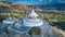 Aerial view Shanti Stupa buddhist white domed stupa overlooks the city of Leh, The stupa is one of the ancient and oldest stupas