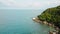 Aerial view of shore rocks and sea waves